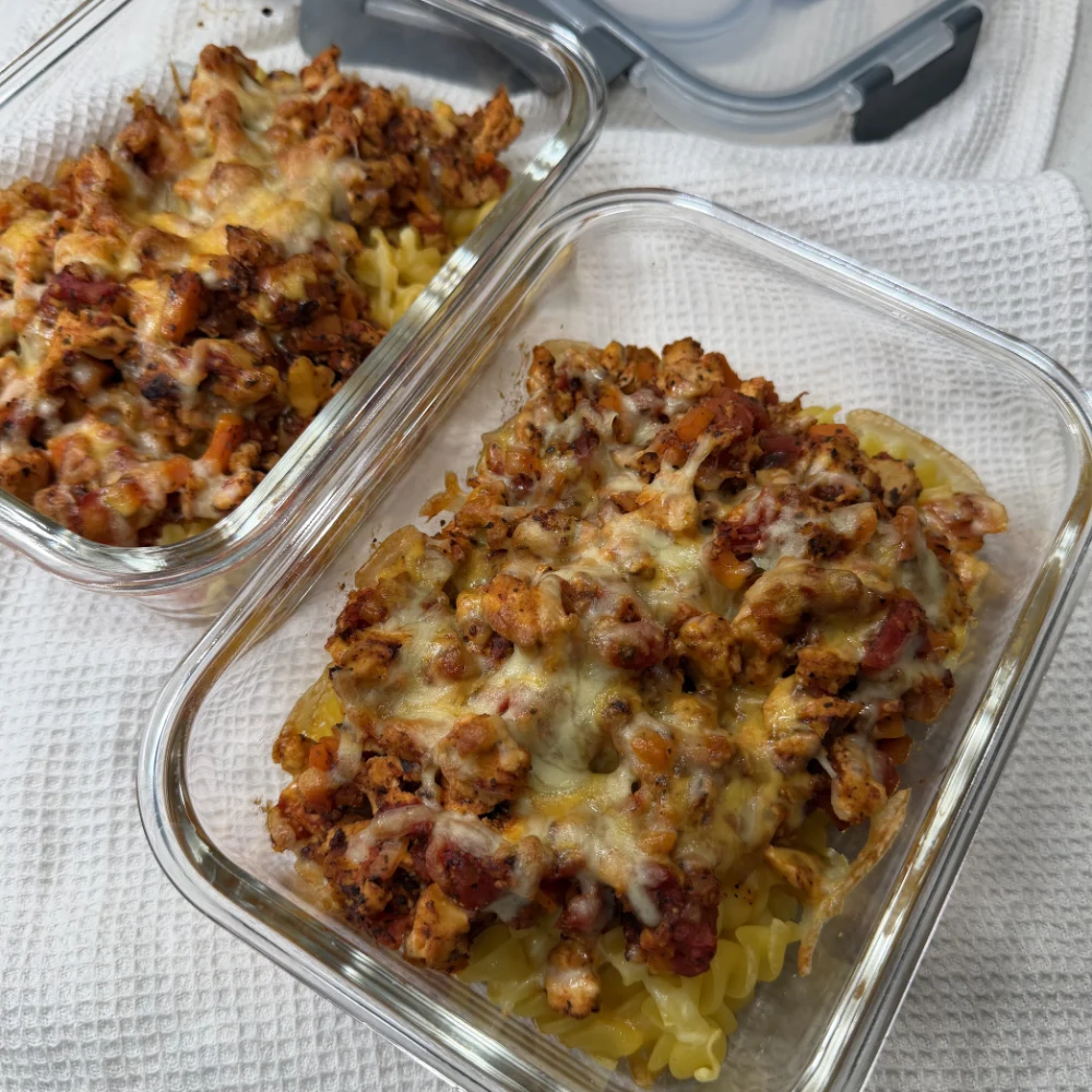 Baked pasta with mince and cheese in a meal prep container